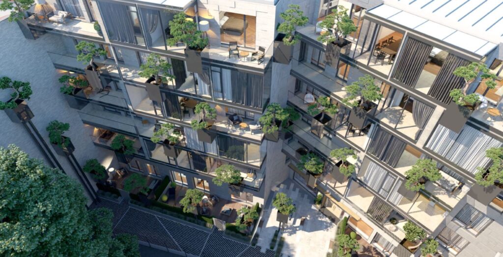 ''HOFT'' jaunā projekta ēkas iekšpagalms un ēkas balkoni ar vertikālo dārzu.