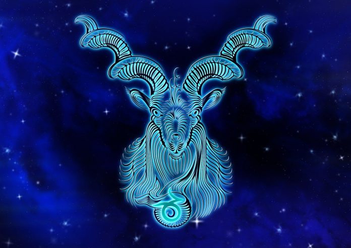 Mežāzis horoskops. Zodiaka zīme Mežāzis uz tumši zila fona