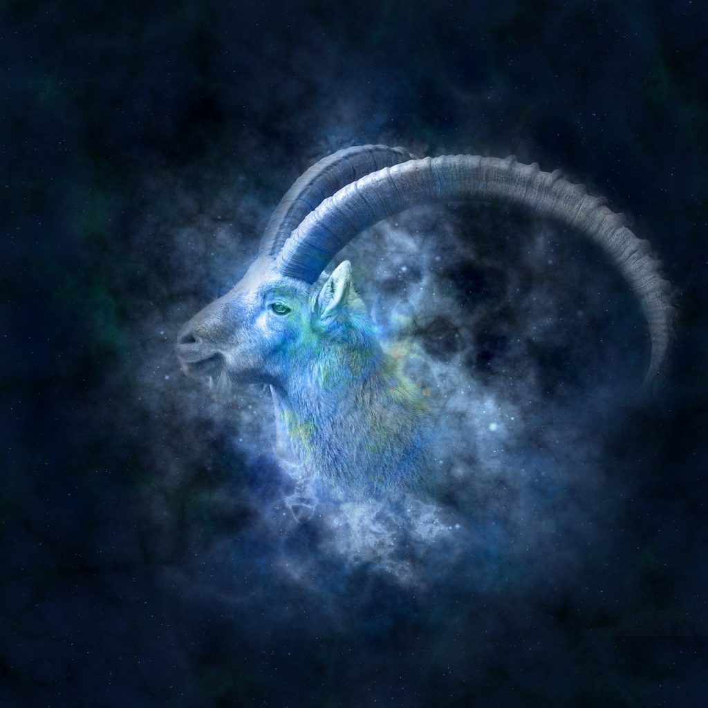 Mežāzis Horoskops: Zodiaka zīme Mežāzis ilustrēts uz zila fona
